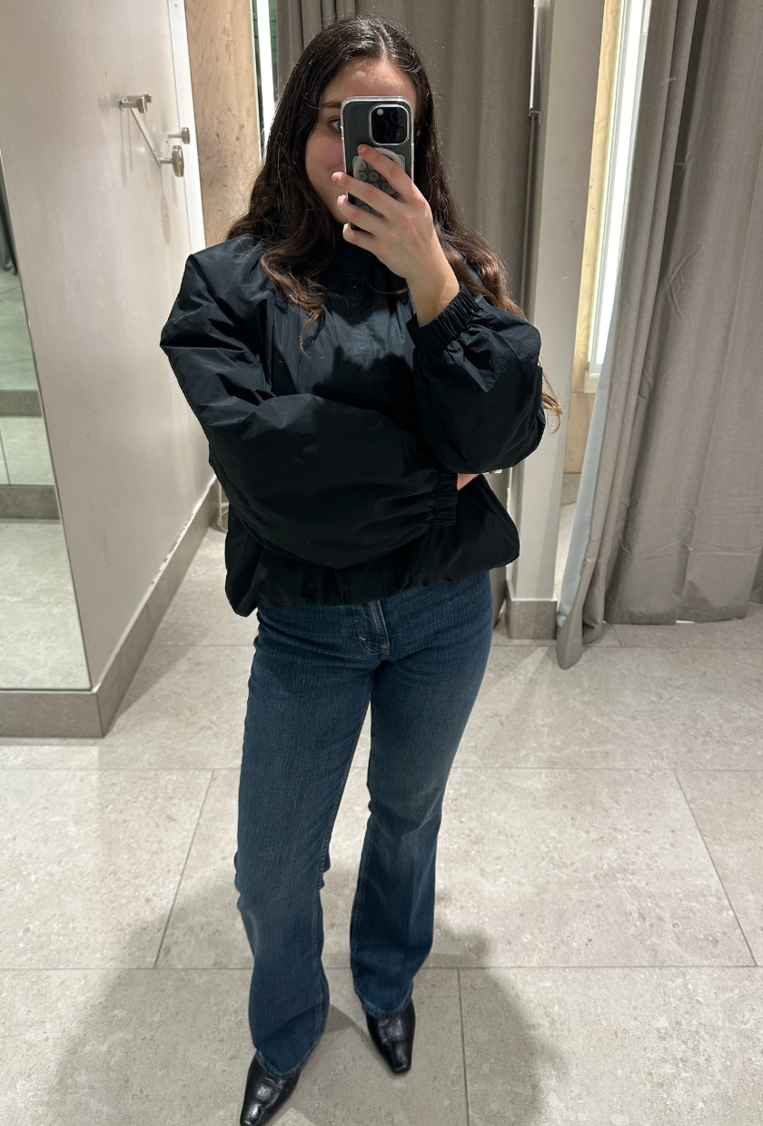 An image of Who What Wear UK SEO Writer, Ava Gilchrist, wearing H&amp;amp;M bootcut jeans.