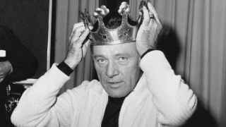 Actor Richard Burton wearing a crown in 1976