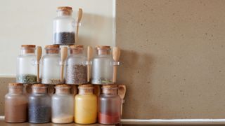 Spice containers stacked on a table