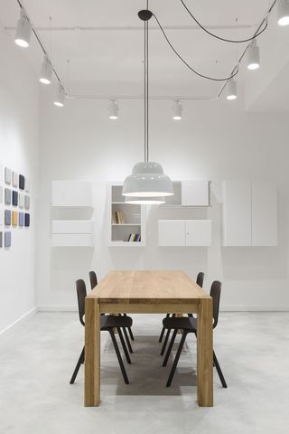 Table & chairs in white showroom