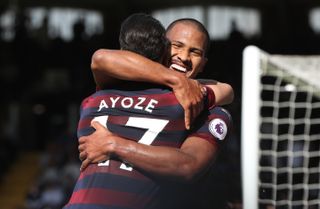 Salomon Rondon, right, embraces Ayoze Perez after scoring Newcastle’s fourth