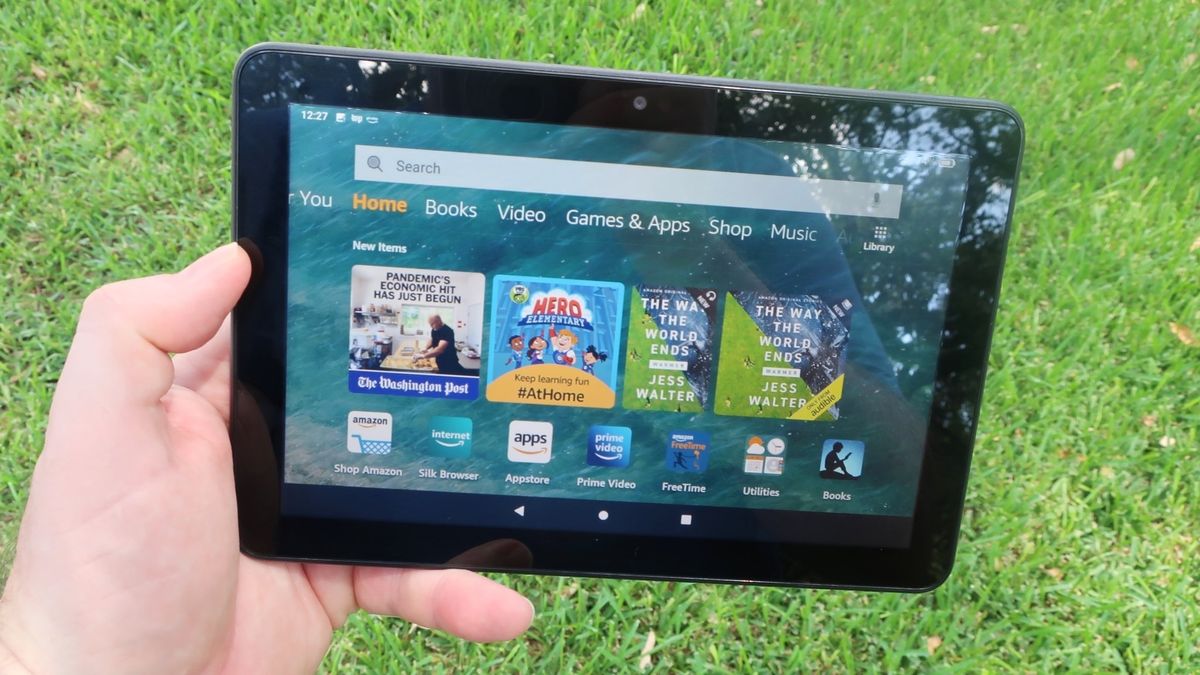 Amazon Fire HD 8 home screen in-hand