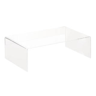 A clear acrylic riser shelf