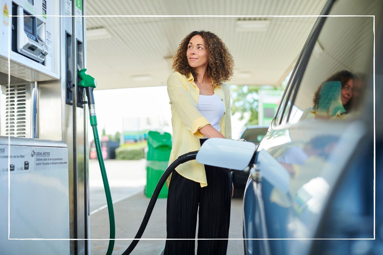 woman filling her car up at the petrol station