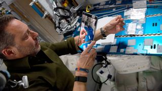 Axiom-1 mission specialist Mark Pathy participates in an augmented reality experiment on the International Space Station. Axiom-1 flew several non-career astronauts to space in 2022, including Pathy.