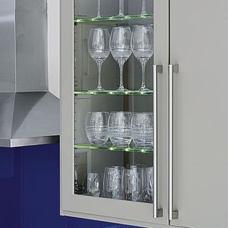 wall cabinet with glassware and storage