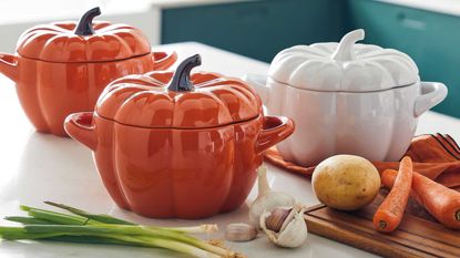 Pumpkin shaped casserole dish on countertop