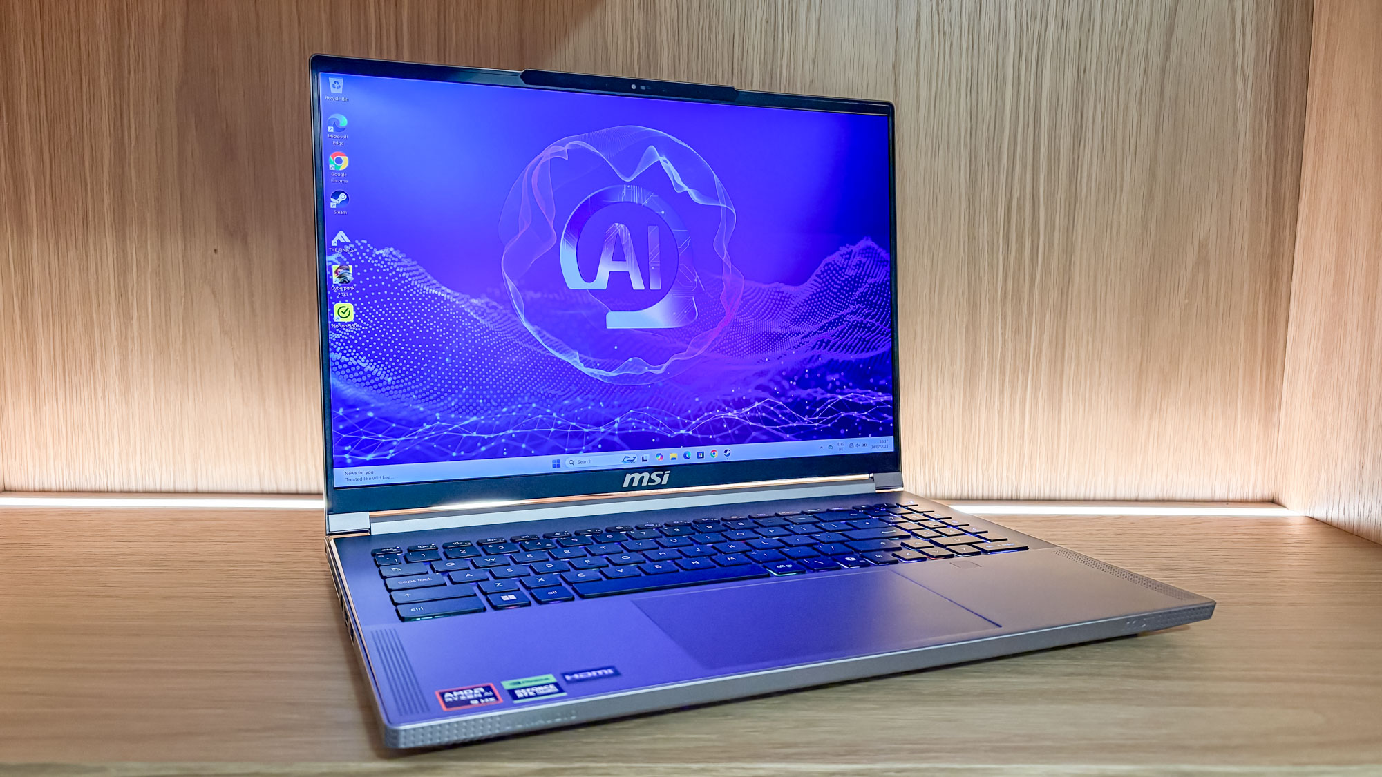 MSI Creator A16 AI+ on wooden shelf with light in the background