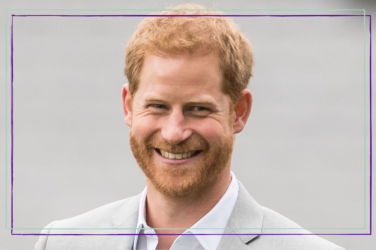 A picture of Prince Harry smiling and wearing a beige suit, as he visits Croke Park, home of Ireland&#039;s largest sporting organisation, the Gaelic Athletic Association on July 11, 2018 in Dublin, Ireland