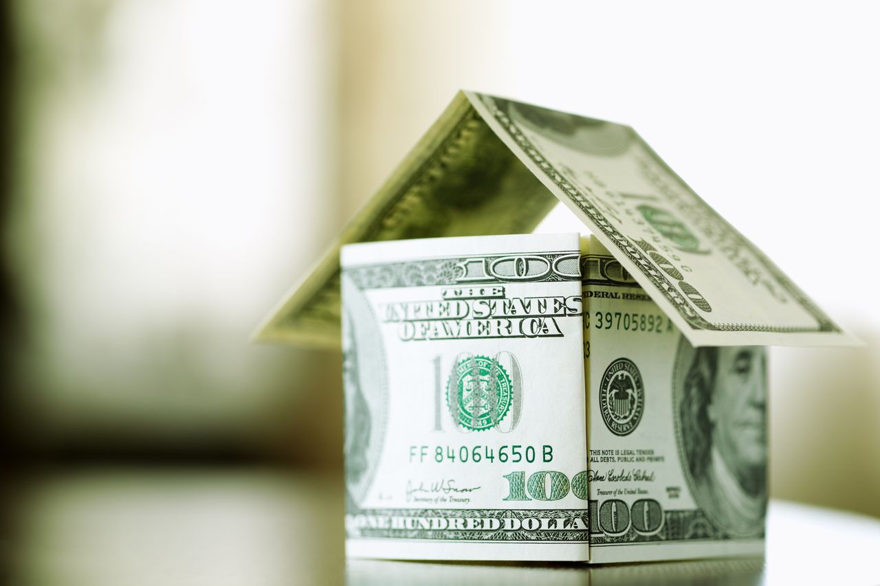 image of dollar bills in the shape of a house