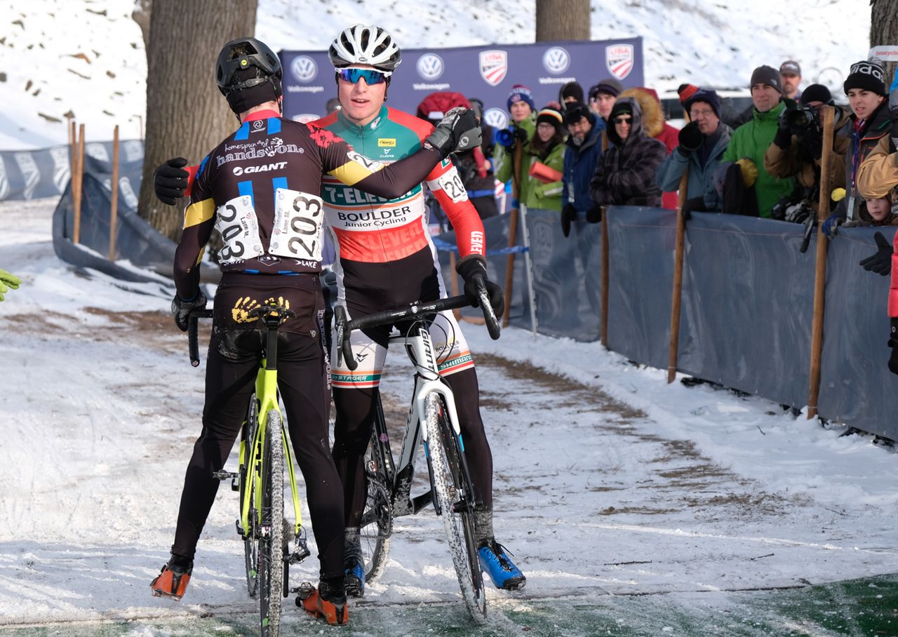 Lane Maher congratulates Denzel Stephenson (Boulder Junior Cycling) on his victory