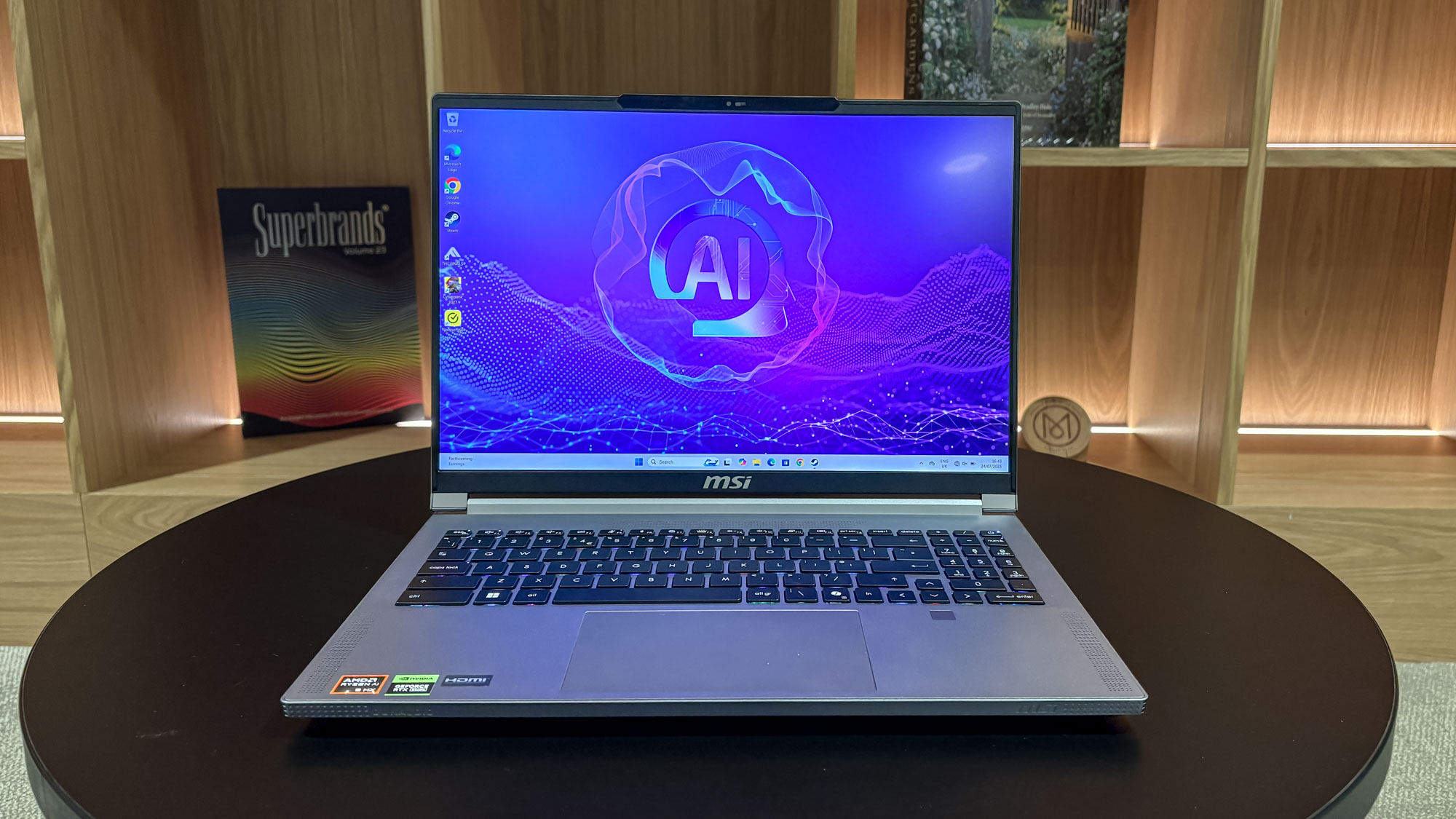 MSI Creator A16 AI+ open on table with open shelves in background