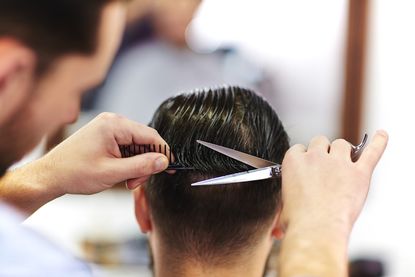 A man getting his hair cut.