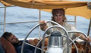 Adrift Sam Claflin Shailene Woodley sitting at the wheel of the ship