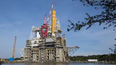 The Space Launch System sits in the middle of NASA's heavy-duty B-2 Test Stand at NASA&rsquo;s Stennis Space Center near Bay St. Louis, Mississippi.