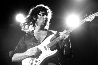 Ritchie Blackmore of Deep Purple performs on stage on the Perfect Strangers World Tour at the Entertainment Centre, Sydney, 12th December 1984. He plays a Fender Stratocaster guitar