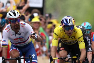 Peter Sagan points a finger at Wout van Aert during the 2022 Tour de France