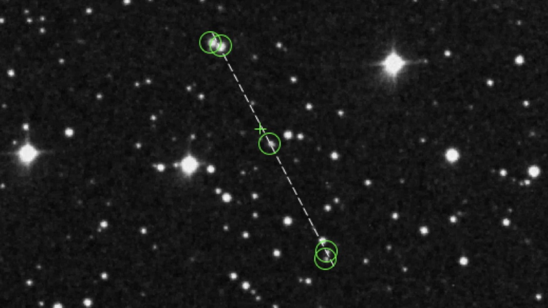 images of stars on a black background, with what appear to be other stars among them circled by dotted lines