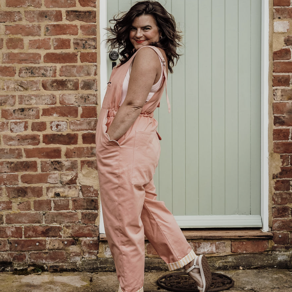 woman wearing pink britches outside