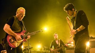 Robbie McIntosh, Sean Hurley and John Mayer perform on stage at the Civic Hall on January 19, 2010 in Wolverhampton, England