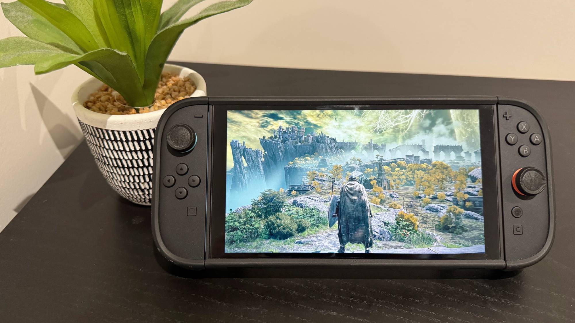 A Nintendo Switch 2 on a table playing Elden Ring: Tarnished Edition