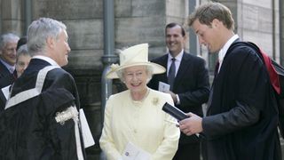 Prince William and Queen Elizabeth II talk to University staff after a graduation ceremony at the University Of St Andrews