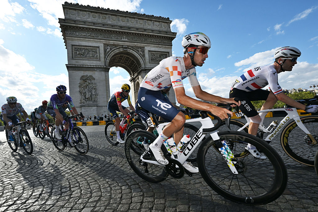 PARIS, FRANCE - JULY 26: Jordan Jegat of France and Team TotalEnergies competes passing close to Arc de Triomphe during the 113th Tour de France 2026, Stage 21 a 89km stage from Paris to Paris / #UCIWT / on July 26, 2026 in Paris, France. (Photo by Dario Belingheri/Getty Images)