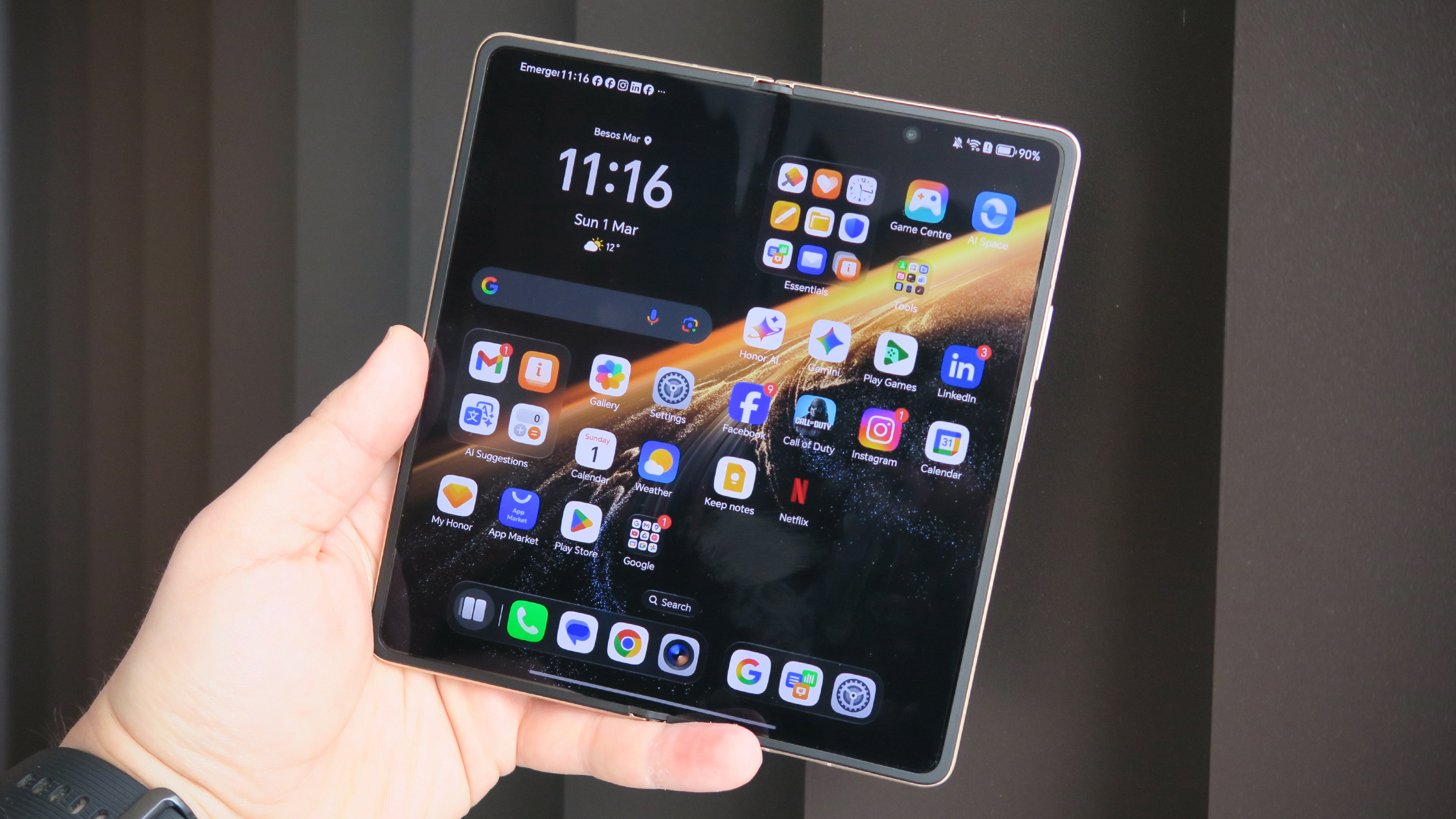 Honor Magic V6 hands on front angled open