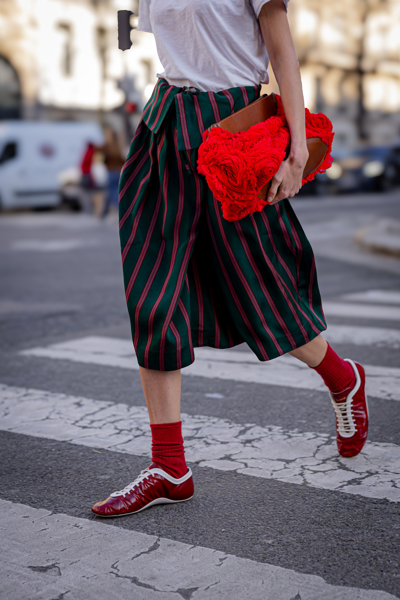 woman wearing red ballet sneakers