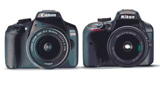 Canon 1300D next to Nikon D3400