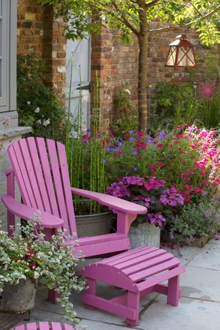 Wooden deckchair painted pink