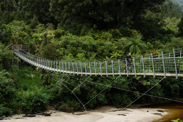 Payson McElveen makes a water crossing during Great Tracks ride