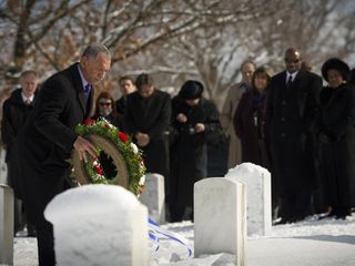 NASA Administrator Charles Bolden places a wreath at Arlington National Cemetery as part of NASA's Day of Remembrance, Thursday, Jan. 27, 2011. The memorial recognizes the Apollo 1, Challenger and Columbia crews, along with other NASA personnel lost in th