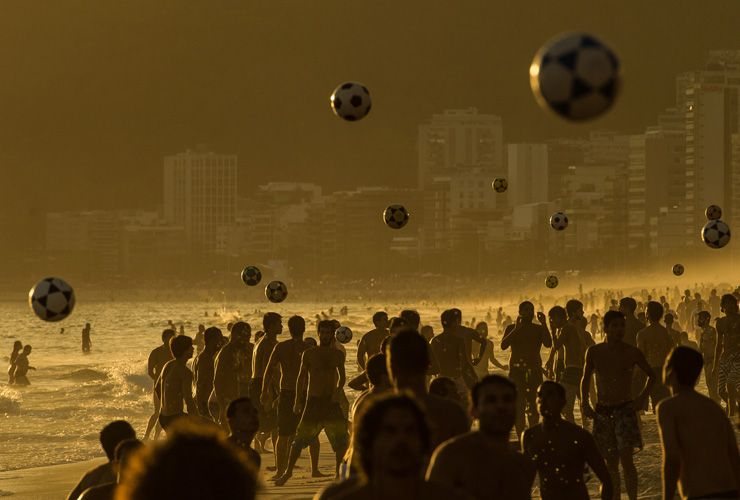 Footballing beach-goers in Rio