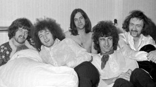 The Pretty Things lying on a bed in 1967