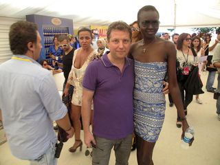 Alek Wek with the designer Atil Kutoglu, wearing one of his creations. The designer showed his collection on the second day of fashion week