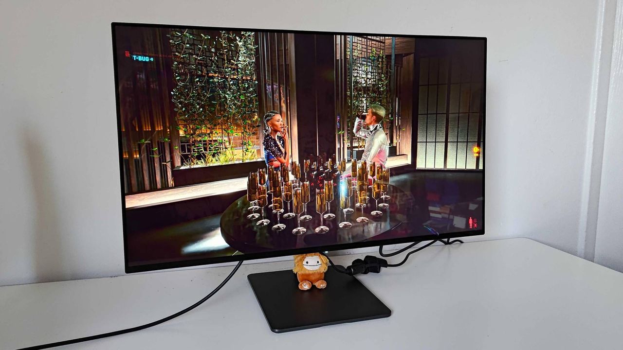 Dough Spectrum One monitor with Cyberpunk 2077 NPCs on screen