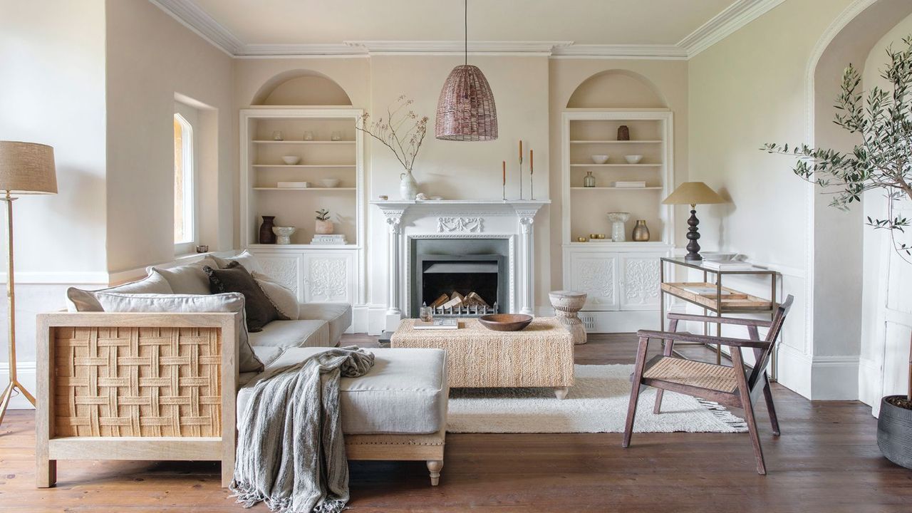 neutral living room scheme with woven sofa with rattan pendant lamp