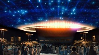 An alien mothership lands over a military base in Close Encounters of the Third Kind