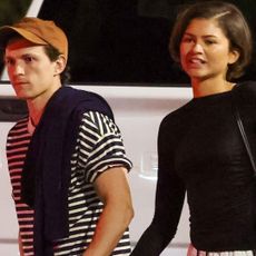 Zendaya and Tom Holland were spotted in color coordinating outfits, plus flats and Adidas Sambas sneakers respectively