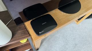 Humax Aura smart PVR viewed from above on wooden unit
