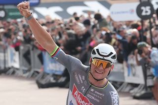 Alpecin-Deceuninck's Dutch rider Mathieu van der Poel celebrates after crossing the finish line to win the 122nd edition of the Paris-Roubaix one-day classic cycling race, 259,2 km between Compiegne and Roubaix, at the Vélodrome André-Pétrieux in Roubaix, northern France on April 13, 2025. (Photo by Francois LO PRESTI / AFP)