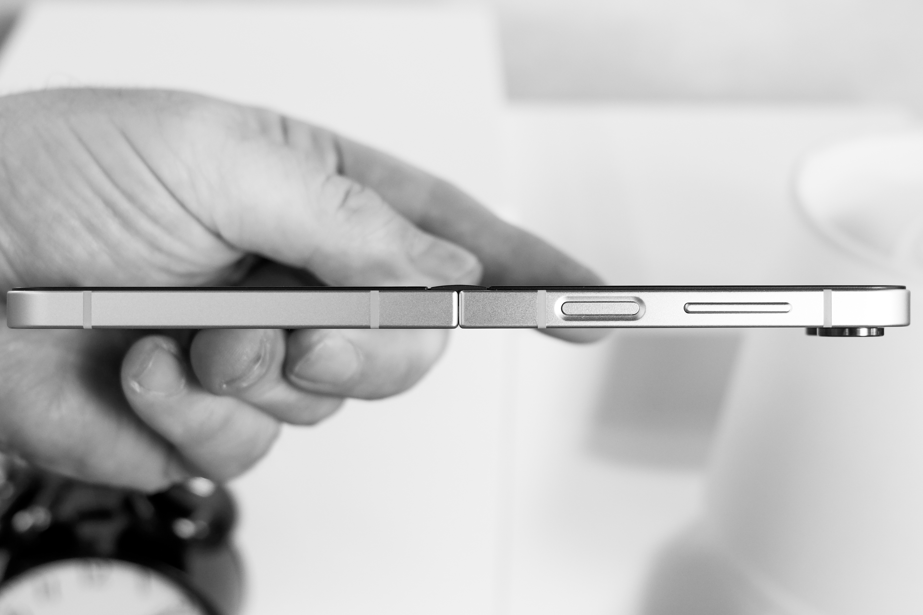 Samsung Galaxy Z Flip 7 FE open held from the side