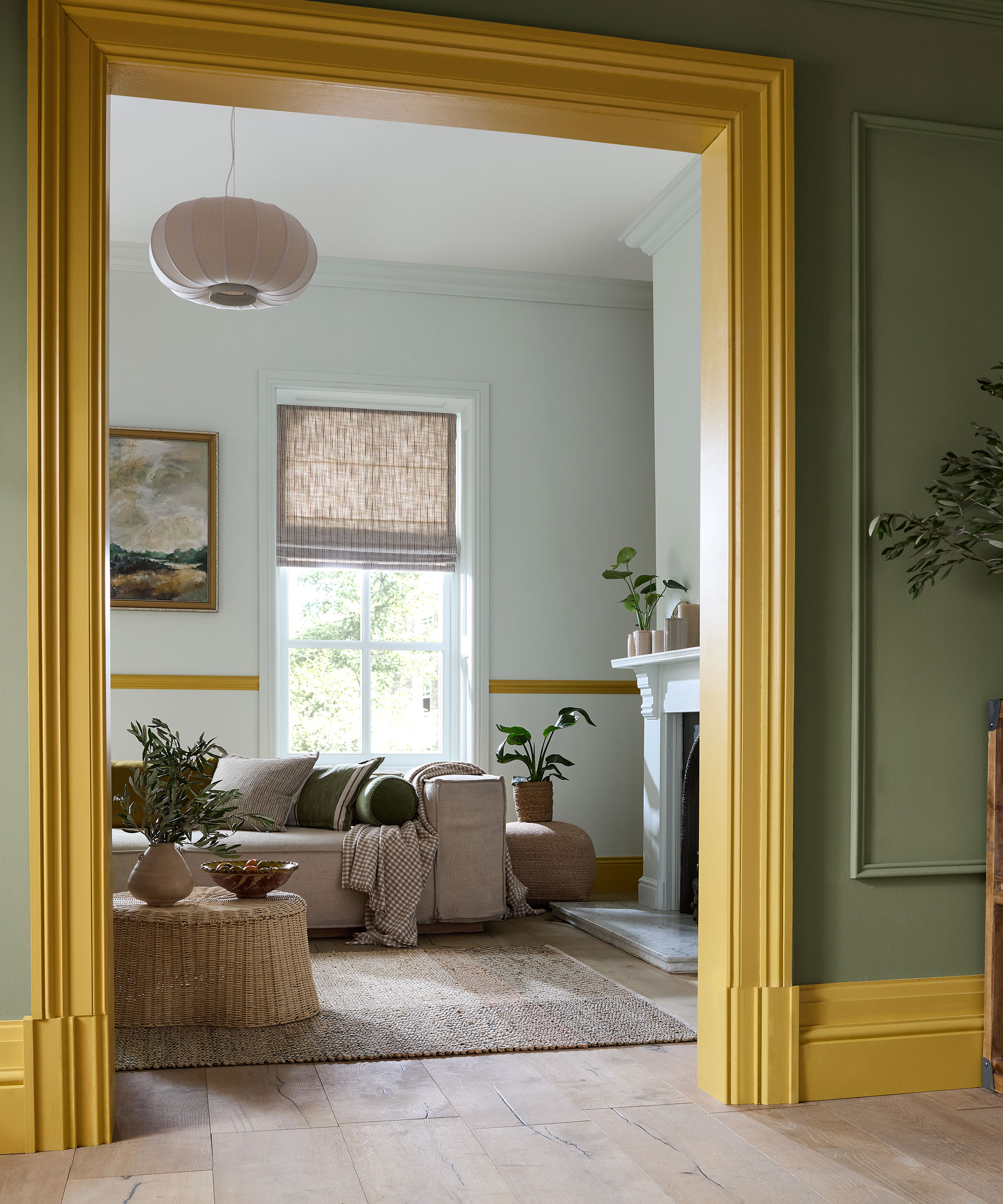 yellow painted architrave and skirting boards