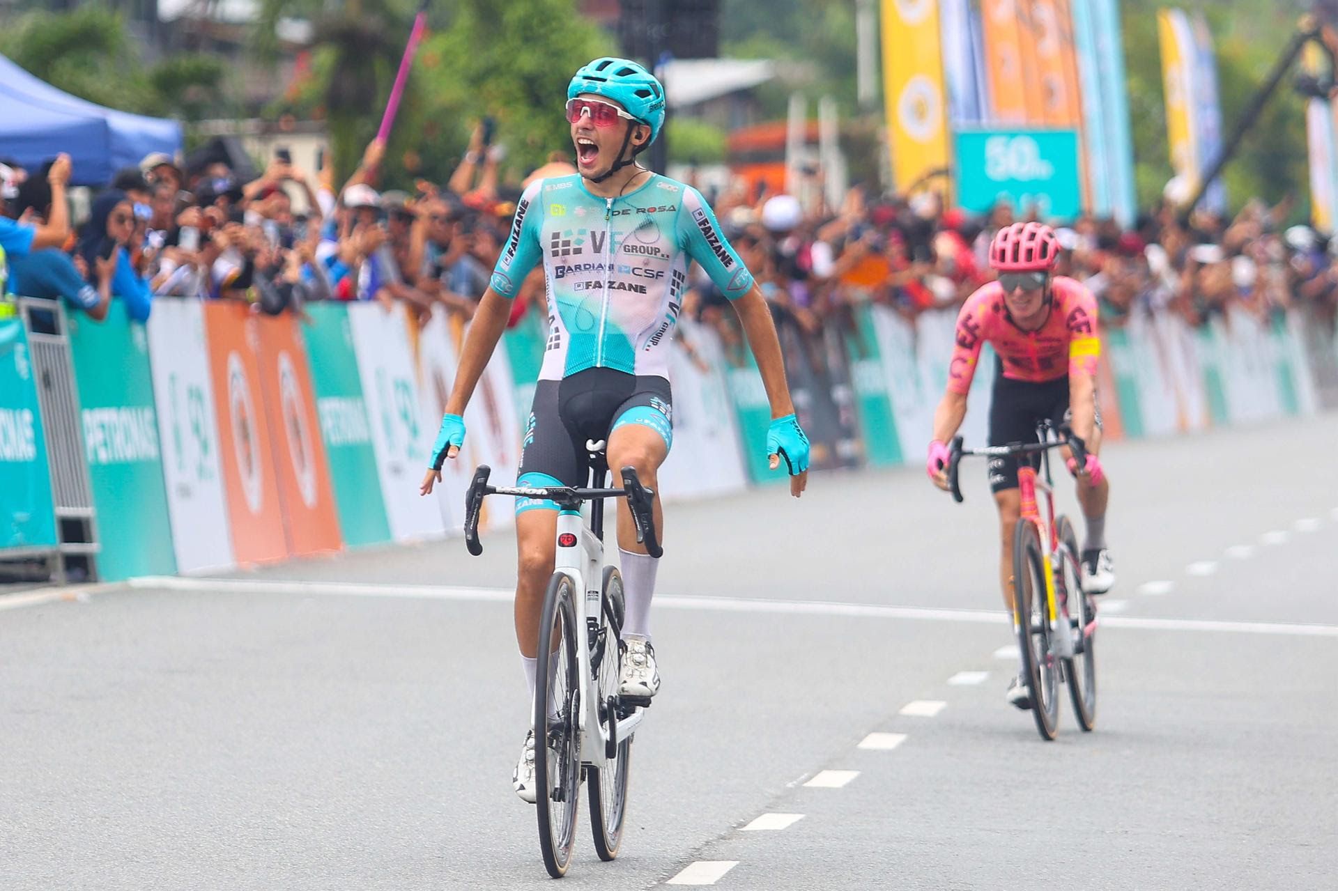 Le Tour De Langkawi stage 6 Manuele Tarozzi wins from twoup break as