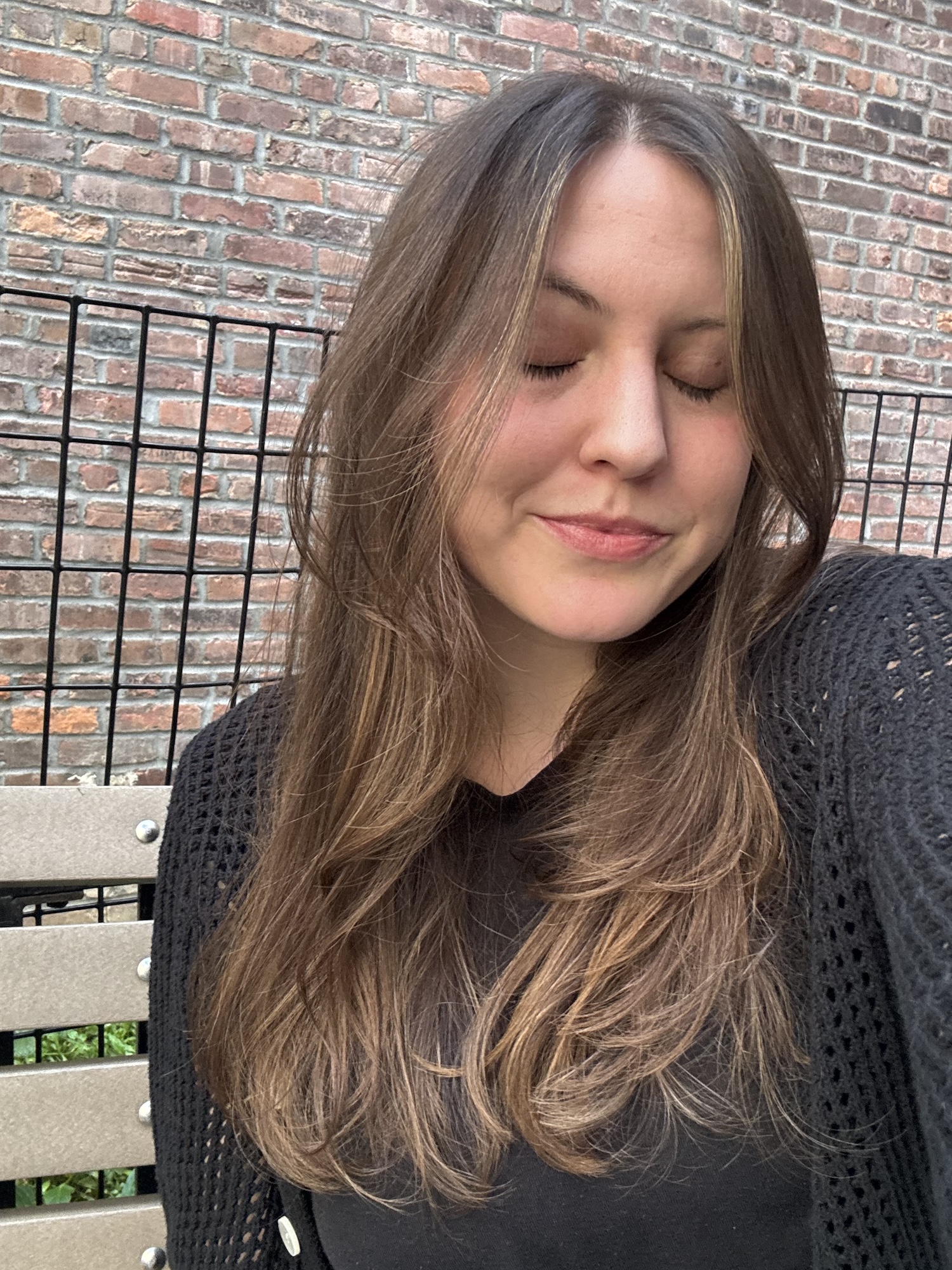 Sophia Vilensky showing off her happy hair after using RŌZ Hair Milk.