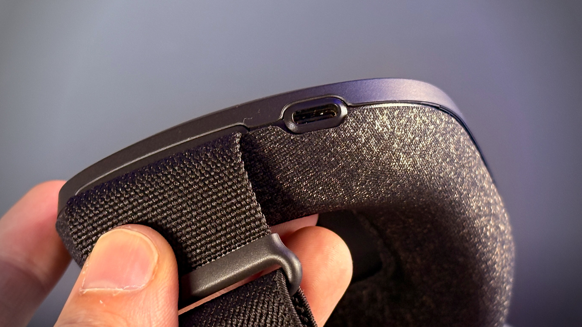 The USB Type-C charging port on the side of the battery pack to the rear of the Steam Frame.