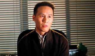 Law and Order: SVU Dr. George Huang speaks in his office