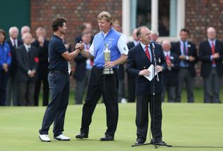 Adam Scott shakes hands with Ernie Els at The Open