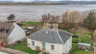 house with Cromarthy Firth nearby